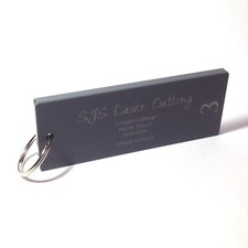 Grey acrylic plastic hotel key fobs tags personalised engraved
