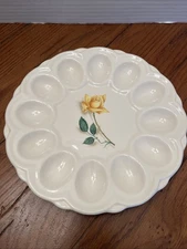 Deviled Egg Dish With A Yellow Rose In Center.