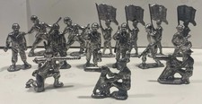 Cast Iron Toy Soldiers, Cowboys, and Indians. Drummers/Flags/Grenadiers 45 .