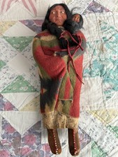 Vintage SKOOKUM BULLY GOOD INDIAN Doll 11  with papoose in very good condition.
