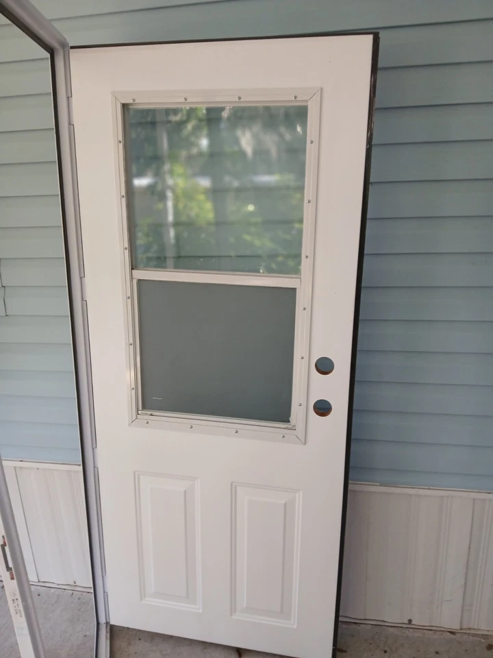 ***Puerta metálica para casa móvil NUEVA 32X74 RH vertical - NUNCA INSTALADA*** Foto 3 de 4