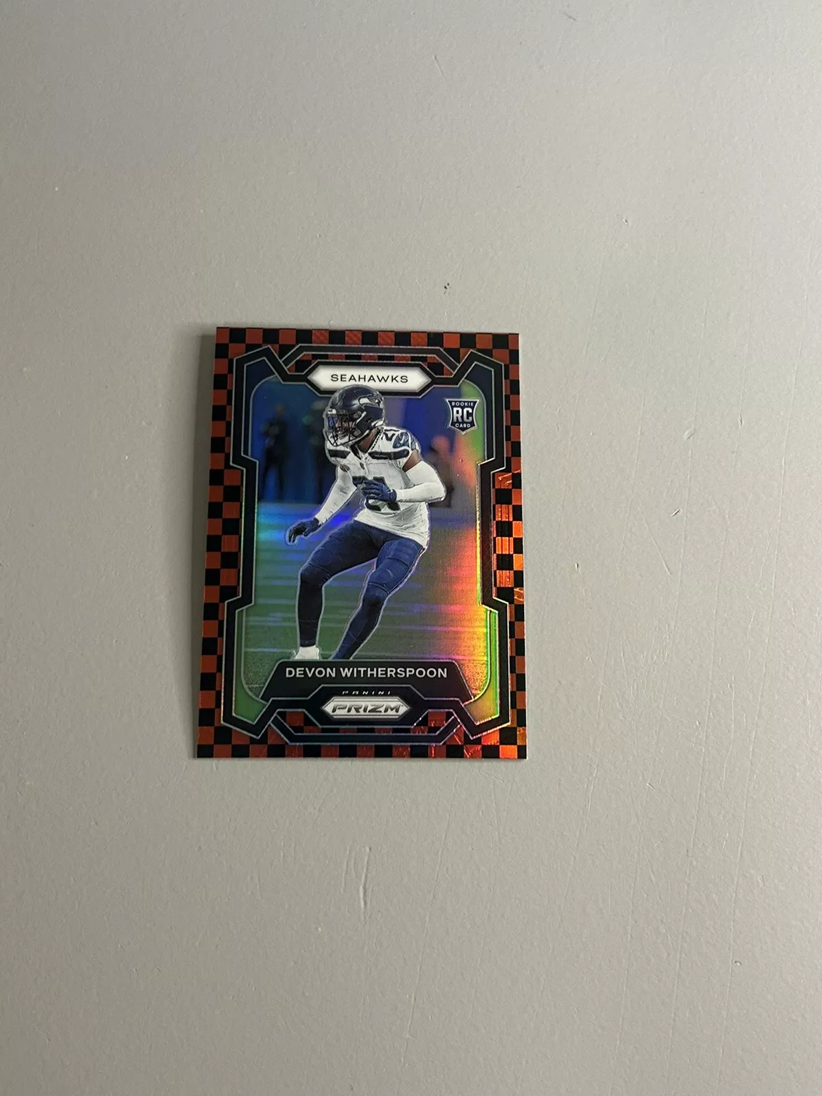 2023 Panini Prizm Devon Witherspoon Black & Red Checkerboard #389 RC SP Case Hit