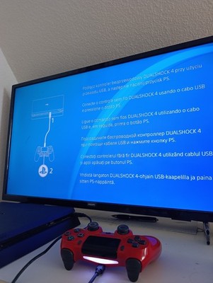 Sony PlayStation 4 Slim Heimkonsole Schwarz inkl. DualShock 4 Controller (rot)