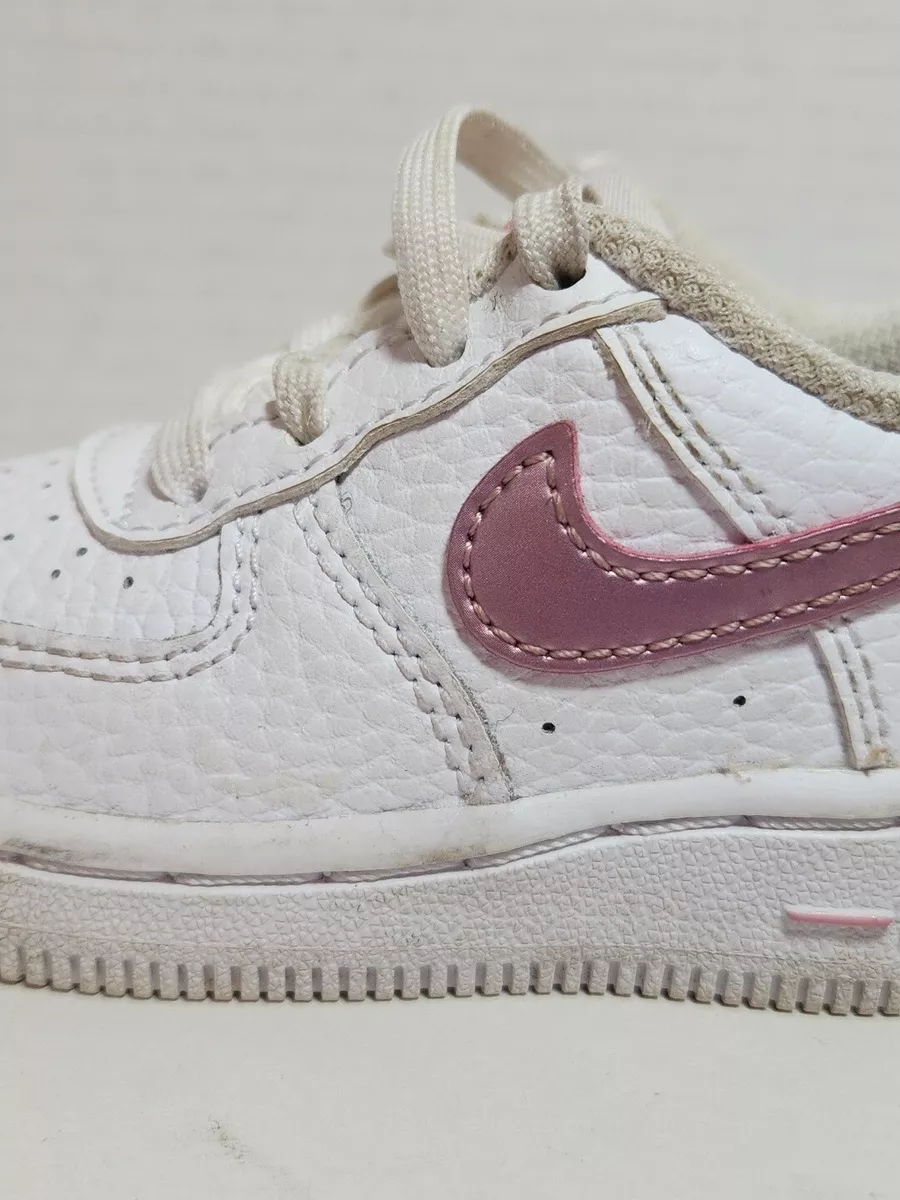 Kids pink top nike trainers