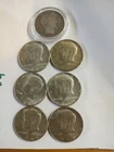 lot of 40 Percent Silver Kennedy Half Plus A 1906 D Barber Half