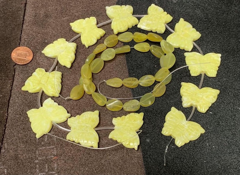 2 strands carved Lemon jade Butterfly/ pebble beads$0.85 combined s/h (t764g-w4)