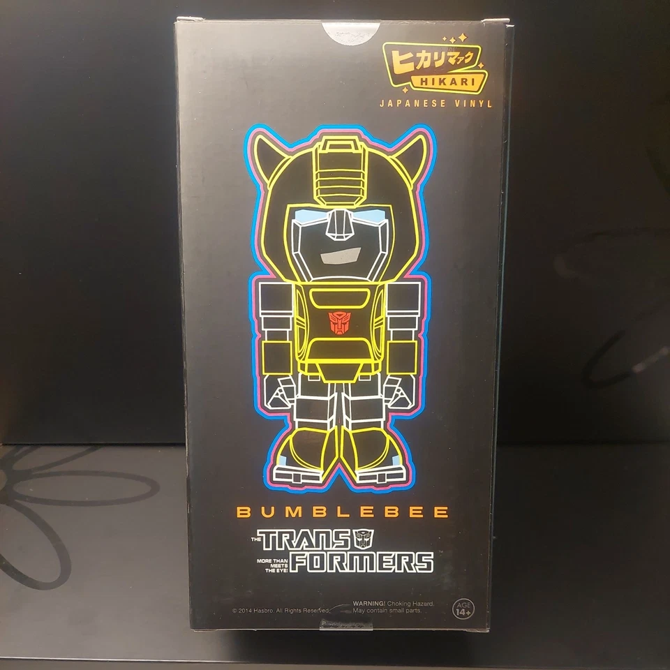 Figura Vinilo Premium Funko Hikari Transformers Bumblebee Brillo Transparente - LE 3000 Foto 2 de 4