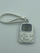 Sony Pocketstation white LCD handheld game tested+working with battery memory image