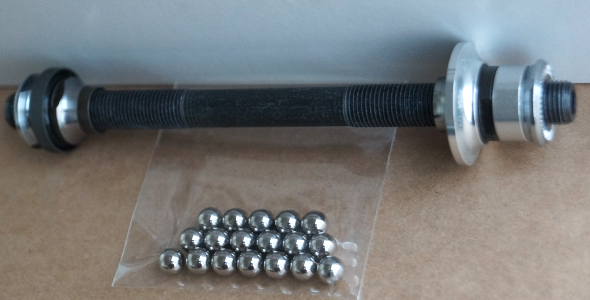 NOS Shimano Dura-Ace FH-7700 Rear Hub Axle + Cones + Bearings