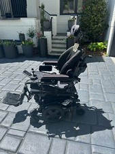 power wheelchair, tilt function, joystick for both user and on rear of chair