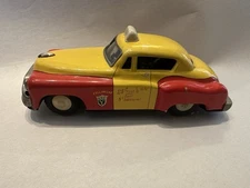 50s Japan AHI Tin Toy Yellow Cab Taxi Safety First Friction Car- Rotating Fare