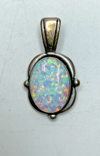 CV64. Sterling Silver and Oval Opal Pendant