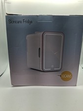 COSMETIC FRIDGE 6 LITER. 10 CAN CAPACITY BRAND NEW UNUSED. APPROX. 11"X12"