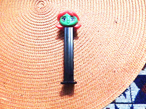 Vintage PEZ Pal Girl w/ Red Haired  Green Face Blac Stem WITH FEET as pictured