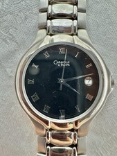Midsize Caravelle by Bulova quartz watch black stainless band, new battery
