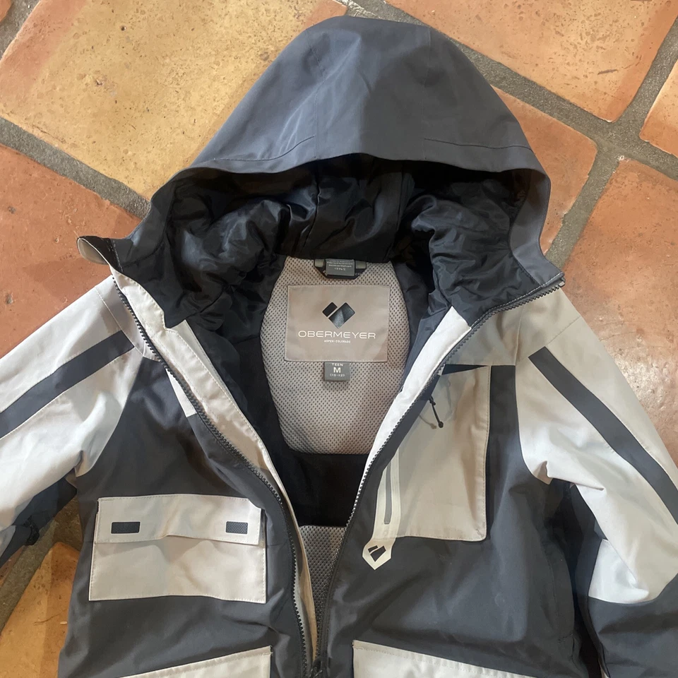 Chaqueta de esquí aislante de flota negra/gris Obermeyer para niños talla adolescente M/10-12 Foto 2 de 4