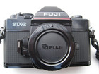 Fujica STX2 noir. Excellent état. Bouchon , courroie
