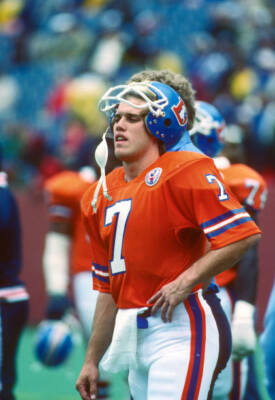 Quarterback John Elway Denver Broncos looks on from the field befo- Old Photo