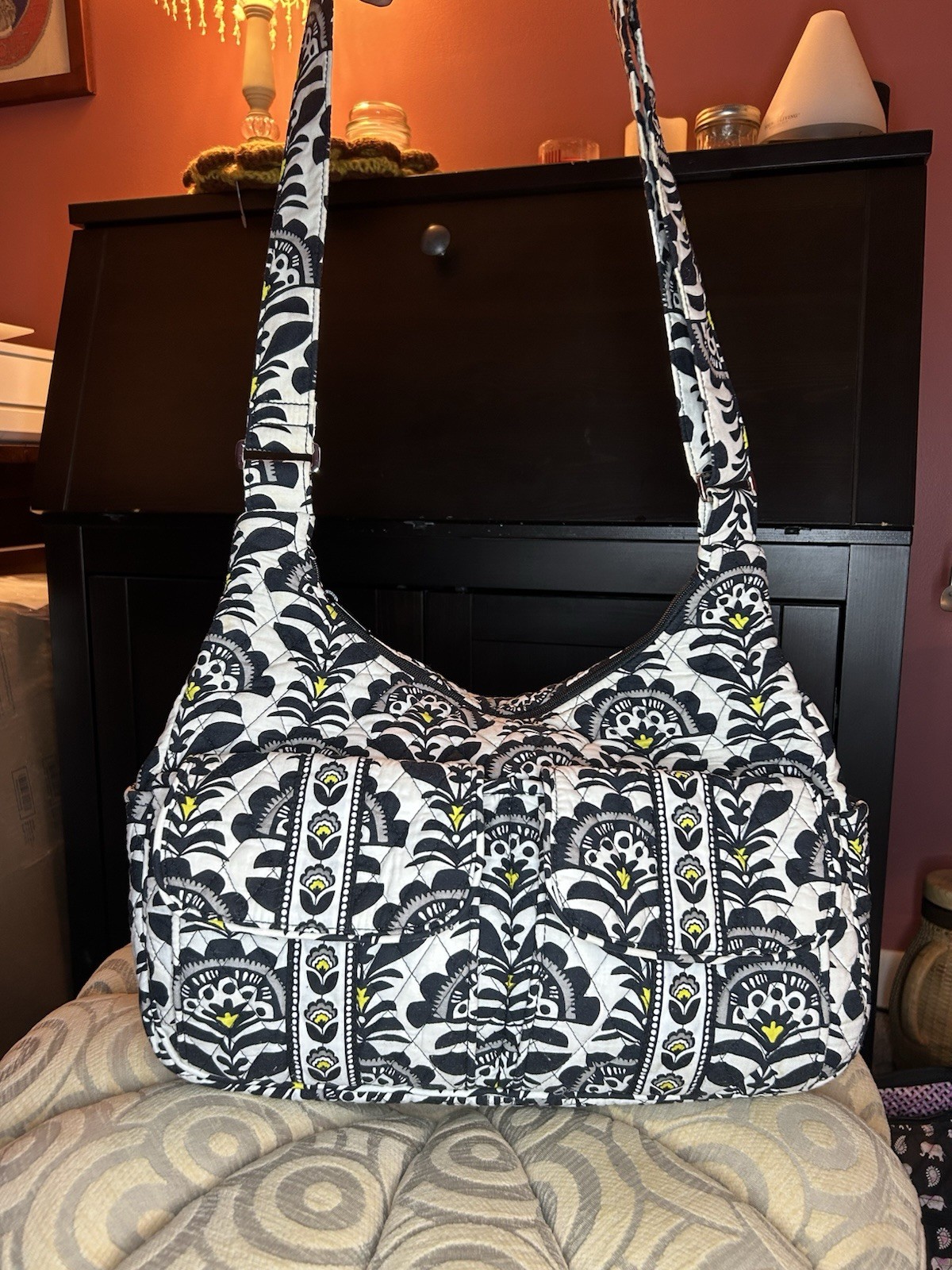 Vera Bradley Fanfare Cargo Sling crossbody bag with adjustable strap.