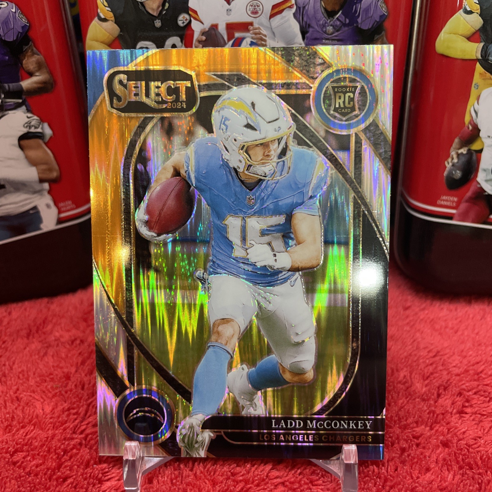 2024 Panini Select - Club Level Ladd McConkey #268 Black & Orange Shock Prizm 