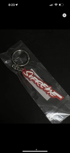 Porte clés Supreme Futura Logo Rouge FW20 NEUF