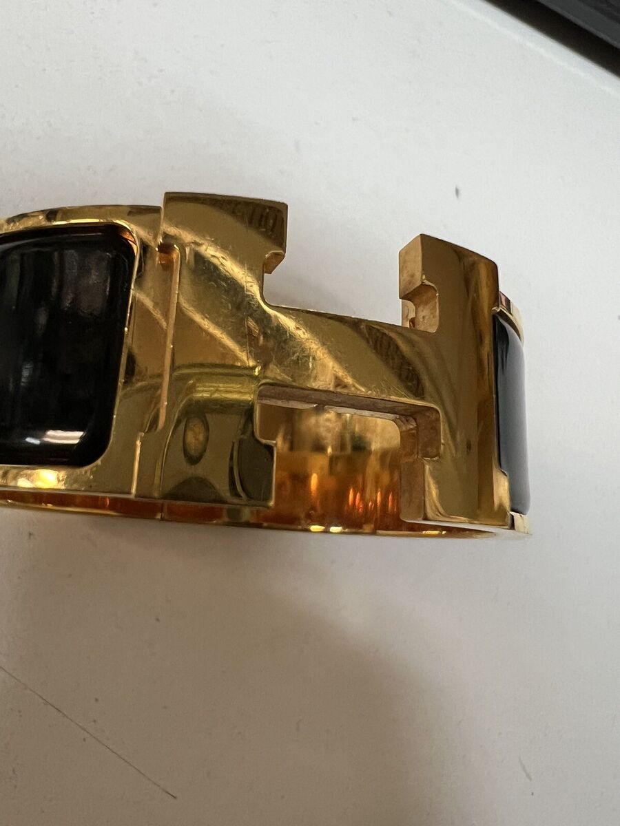 Hermes Click Clac H Bracelet Gold/Noir (Retail $740) Size PM Hermes Click Clac H Bracelet Gold/Noir (Retail $740) Size PM