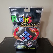 New RUBIK'S SLIDE 10,000 Brain Busting Puzzles ELECTRONIC GAME Rubiks Cube NIB