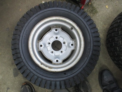 1 used 23 x 10.5-12 sears turf-saver tires on craftsman II rims 5 lug