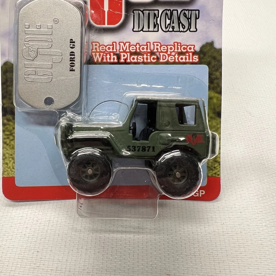Nuevo GI Joe Ford GP réplica de metal fundido a presión 1:64 con etiqueta de perro coche juguete Foto 3 de 4