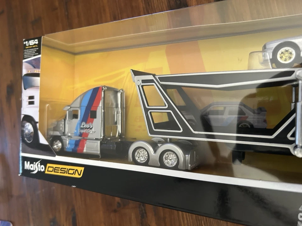 Transporter Mack Anthem and 1988 BMW M3 1:64 Scale Diecast Model Silver Maisto - Image 3 of 4