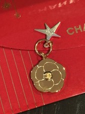 1pc X CHANEL Holiday 2025 Camellia Charm Comet Keychain Novelty Gold Silver