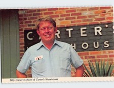 Postcard Billy Carter in front of Carter's Warehouse Plains Georgia