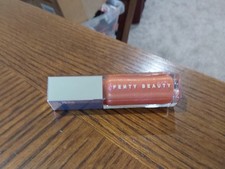 FENTY BEAUTY GLOSS BOMB "FENTY GLOW FANTASY" UNIVERSAL LIP LUMINIZER MELON GLOW