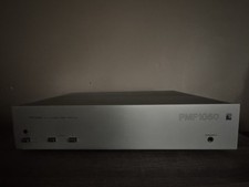 Perreaux PMF1050 4-Channel 100 MOSFET Power Amplifier 100 watts , Silver .