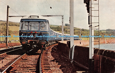 R239477 Ein elektrischer Glasgow Suburban Blue Train nähert sich Craigendoran J Salmo