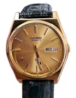 Seiko Men's Vintage SQ 6923-8009 Quartz Watch with Day/Date Gold Tone Dial
