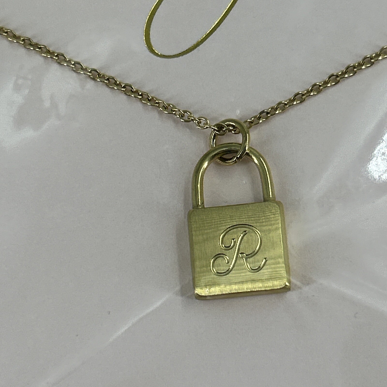 NEW Ellison and Young Scripted Notes Lock Necklace Stainless 18K Gold Plated