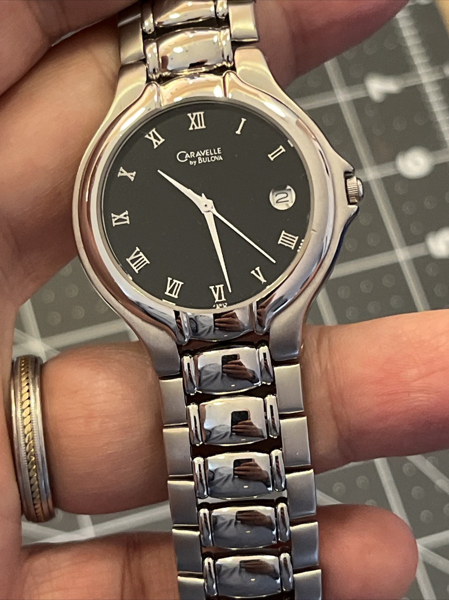 Midsize men's or women's Caravelle by Bulova quartz watch black