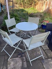Green Metal Round Garden Table with 4 Foldable Chairs pick up South Leeds