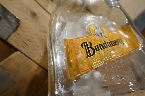 Squished Bundaberg Rum Bottle Bundaberg Distilling Co. - Swanky Barn - Picture 3 of 12