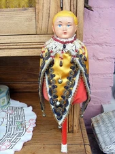 Ancienne  Marotte à musique en très bon état à remonter musique douce .