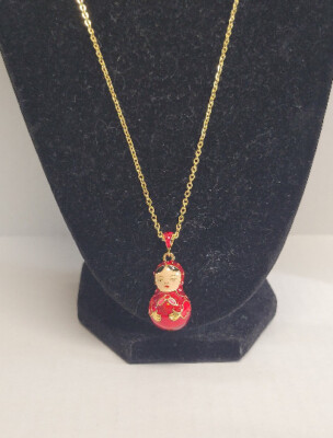 Babushka doll in red necklace