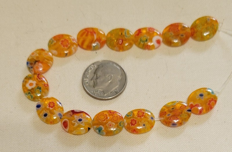 P369 12x10mm millefiore glass oval beads. will combine to save on shipping 