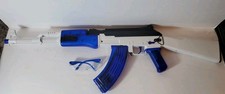 AK-47 style toy gel ball blaster featuring a white/blue body
