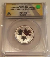 2016 CANADA $3 REVERSE PROOF, MAPLE LEAVES, GILT SILVER, ANACS PF69 DCAM. PR69