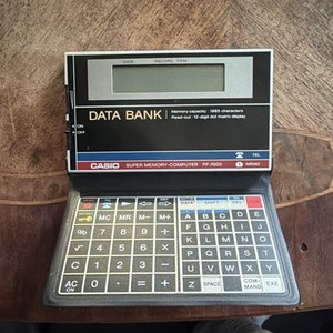 Casio Data Bank Super Memory PF-7000 Handheld Pocket Computer Organizer w/ Case