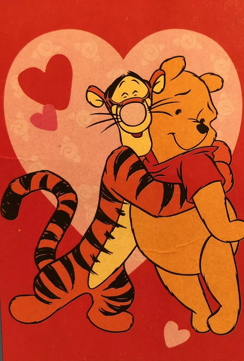 winnie the pooh and tigger hugging