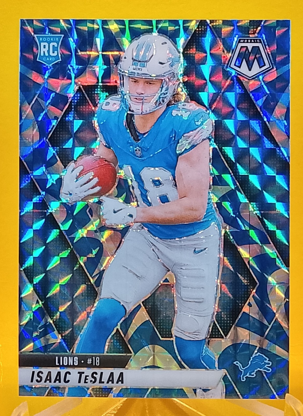 2025 Panini Mosaic Isaac Teslaa Blue Reactive #319 Rookie Detroit Lions RC