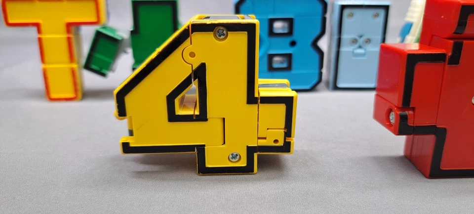 Alphabots Alphabet Transforming Robot Toys Letters & Numbers Lot Of 10 - Image 3 of 4