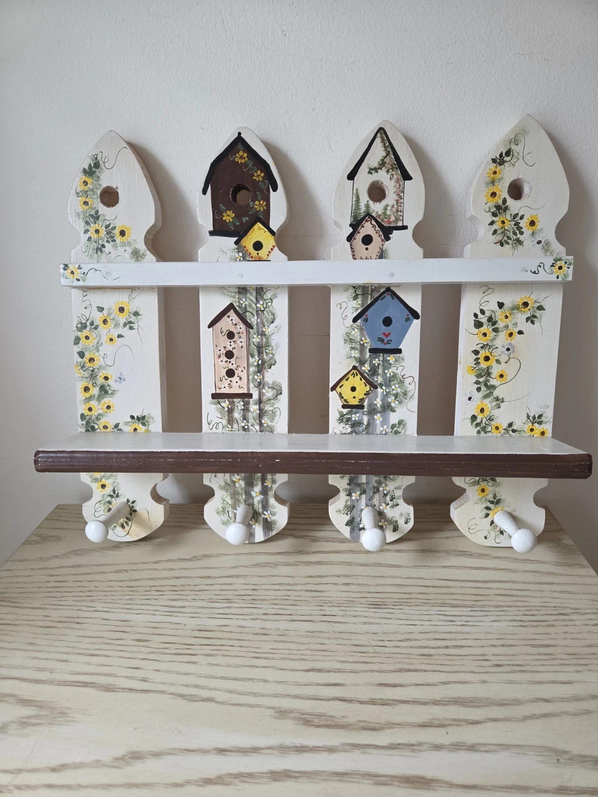 Decorative Wooden Shelf With 4 Dowels Hand Painted With Birdhouse And Flowers